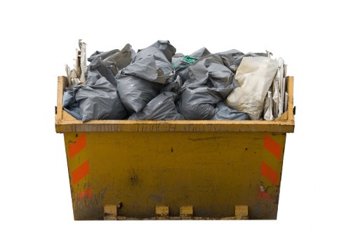 Various types of rubbish being sorted for removal