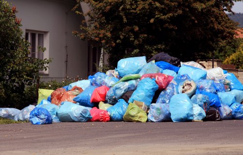 Rubbish removal team handling waste in Tempe