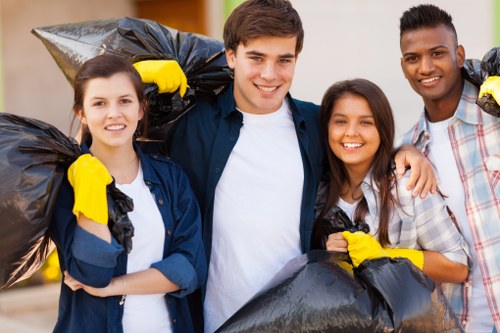 Various types of rubbish being sorted for removal