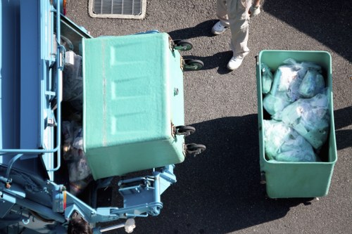 Professional rubbish removal team handling waste