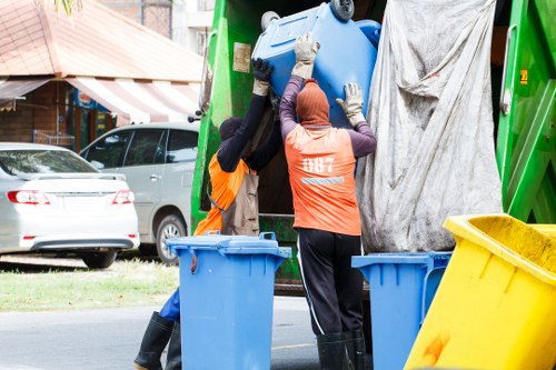 Rubbish removal truck at work in Red Hill